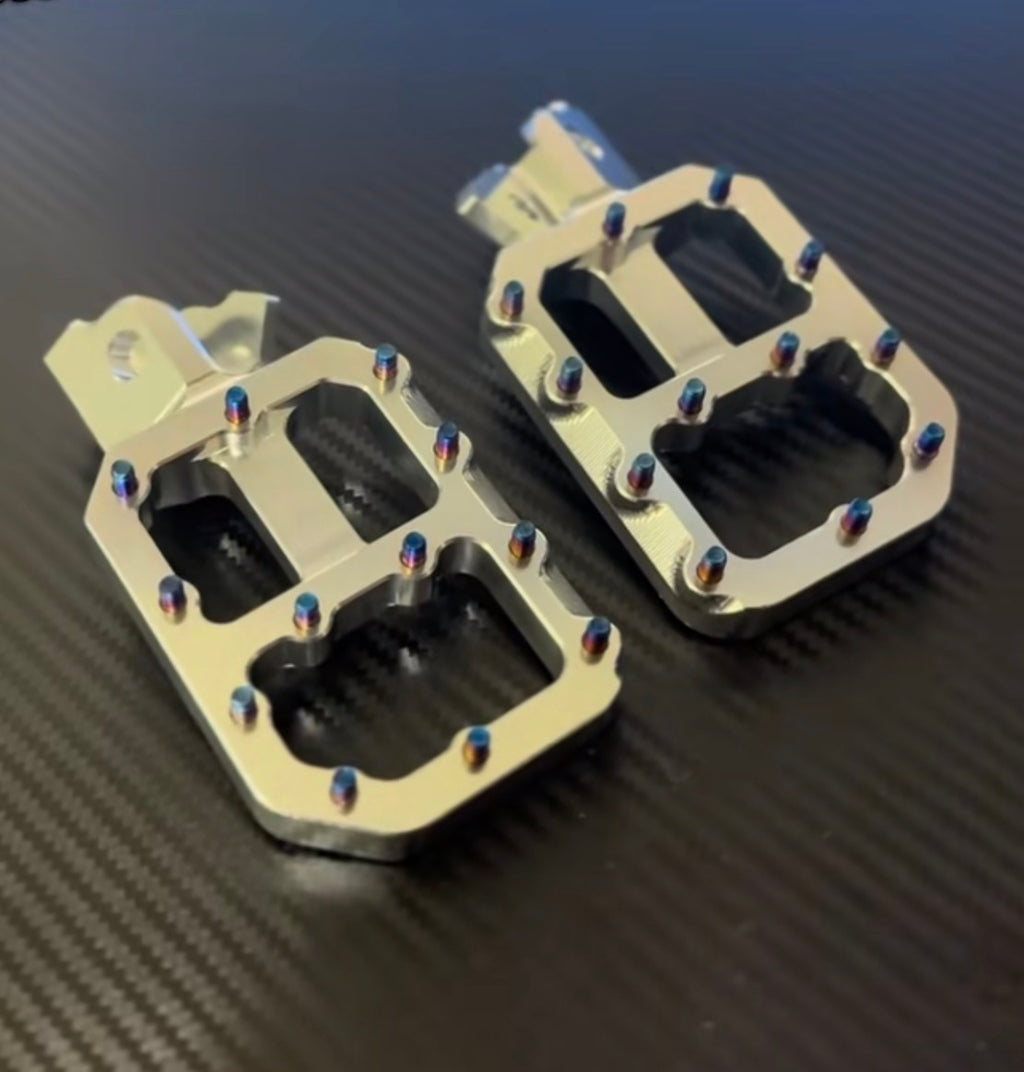 Surron LBX wide foot pegs (titanium studs)